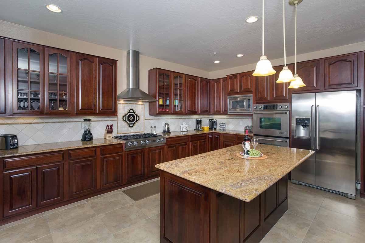 Granite countertops and stainless steal appliances in the kitchen