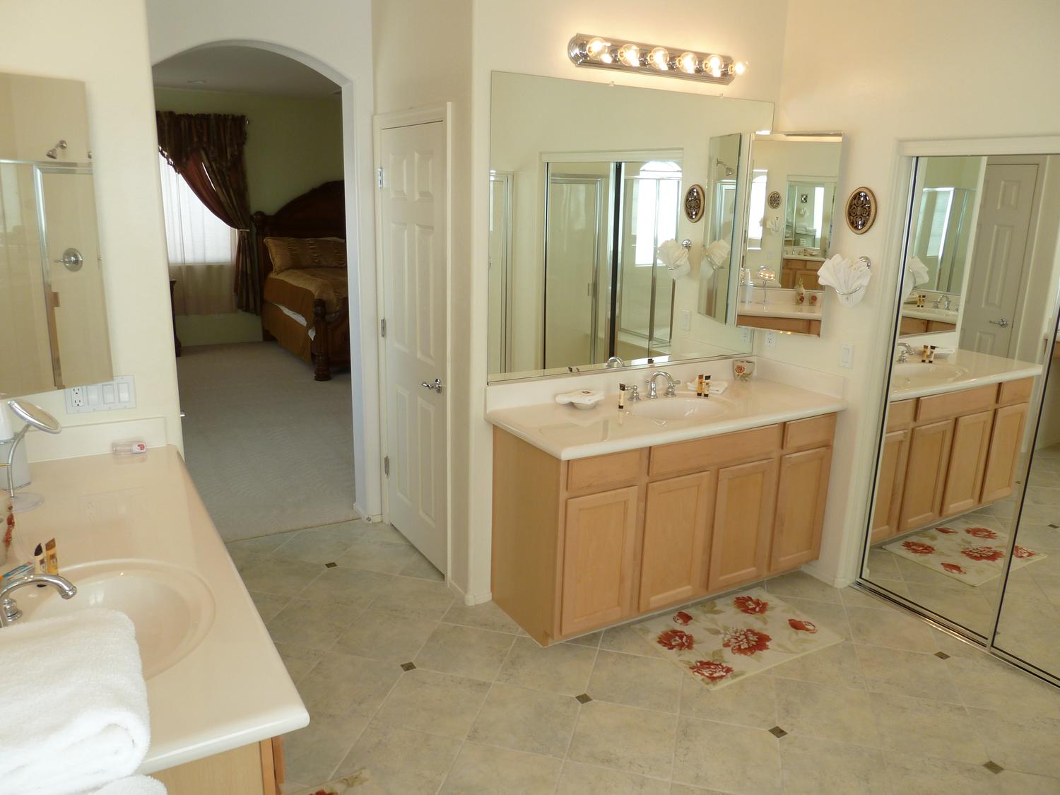 Master bath with him and hers separate sinks